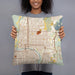 Person holding 18x18 Custom Laredo Texas Map Throw Pillow in Woodblock