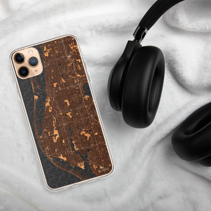Custom Largo Florida Map Phone Case in Ember on Table with Black Headphones