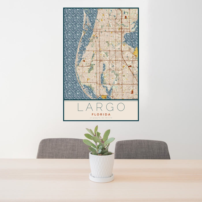 24x36 Largo Florida Map Print Portrait Orientation in Woodblock Style Behind 2 Chairs Table and Potted Plant