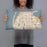 Person holding 20x12 Custom Largo Florida Map Throw Pillow in Woodblock