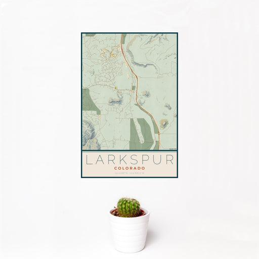 12x18 Larkspur Colorado Map Print Portrait Orientation in Woodblock Style With Small Cactus Plant in White Planter