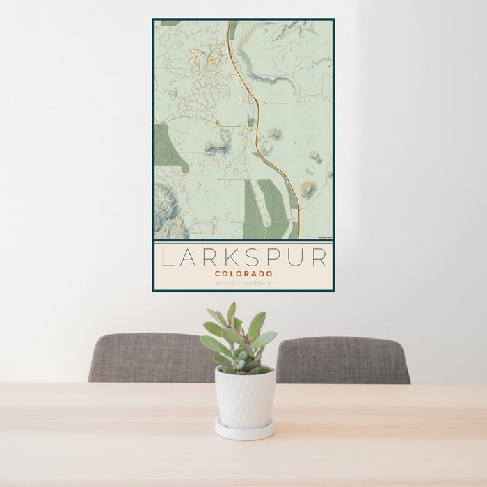 24x36 Larkspur Colorado Map Print Portrait Orientation in Woodblock Style Behind 2 Chairs Table and Potted Plant