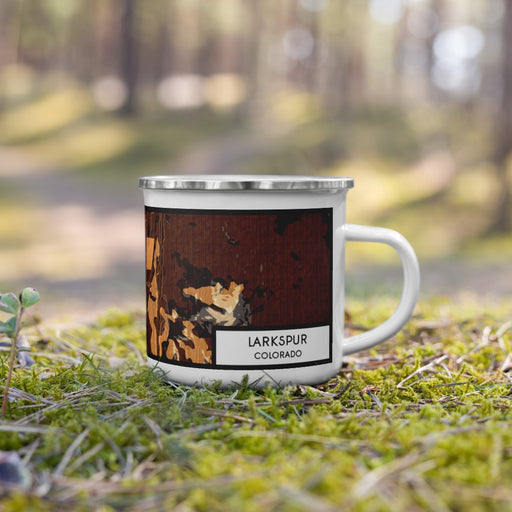 Right View Custom Larkspur Colorado Map Enamel Mug in Ember on Grass With Trees in Background