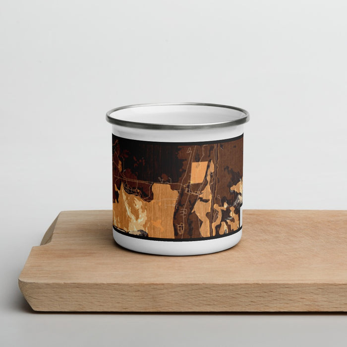 Front View Custom Larkspur Colorado Map Enamel Mug in Ember on Cutting Board