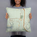 Person holding 18x18 Custom Larkspur Colorado Map Throw Pillow in Woodblock