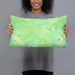 Person holding 20x12 Custom Lassen Volcanic National Park Map Throw Pillow in Watercolor