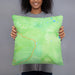 Person holding 18x18 Custom Lassen Volcanic National Park Map Throw Pillow in Watercolor