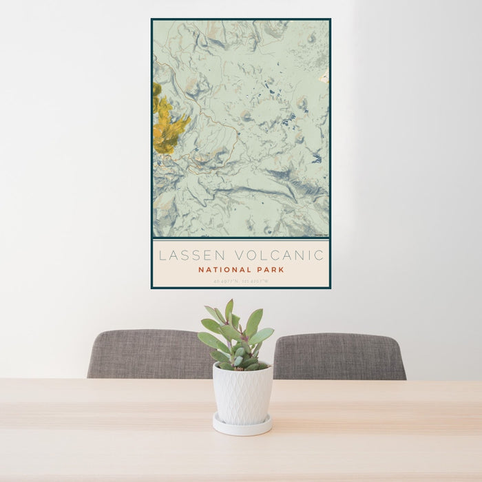 24x36 Lassen Volcanic National Park Map Print Portrait Orientation in Woodblock Style Behind 2 Chairs Table and Potted Plant