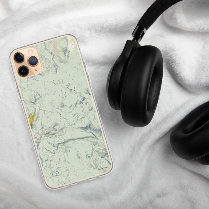 Custom Lassen Volcanic National Park Map Phone Case in Woodblock on Table with Black Headphones