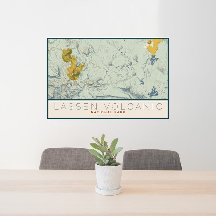 24x36 Lassen Volcanic National Park Map Print Landscape Orientation in Woodblock Style Behind 2 Chairs Table and Potted Plant
