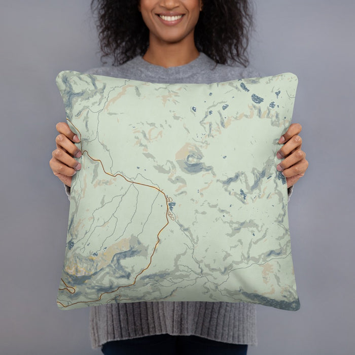 Person holding 18x18 Custom Lassen Volcanic National Park Map Throw Pillow in Woodblock