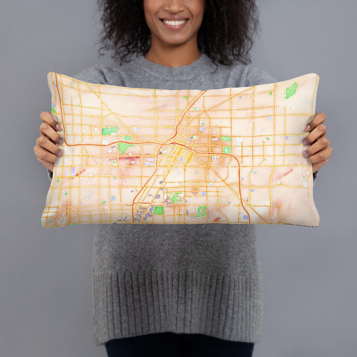 Person holding 20x12 Custom Las Vegas Nevada Map Throw Pillow in Watercolor