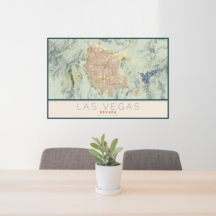24x36 Las Vegas Nevada Map Print Landscape Orientation in Woodblock Style Behind 2 Chairs Table and Potted Plant
