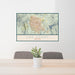 24x36 Las Vegas Nevada Map Print Landscape Orientation in Woodblock Style Behind 2 Chairs Table and Potted Plant