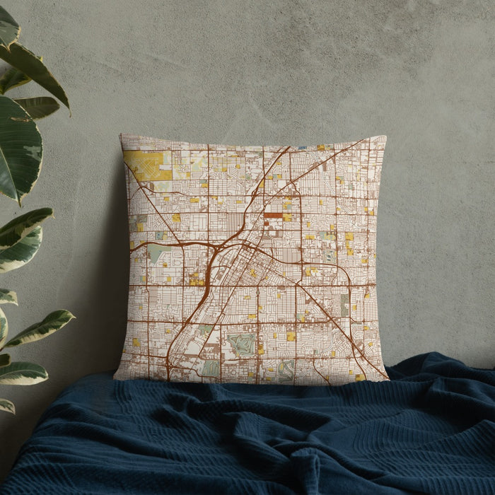 Custom Las Vegas Nevada Map Throw Pillow in Woodblock on Bedding Against Wall