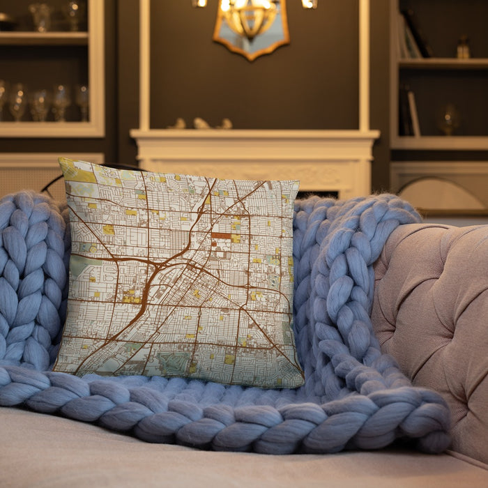 Custom Las Vegas Nevada Map Throw Pillow in Woodblock on Cream Colored Couch