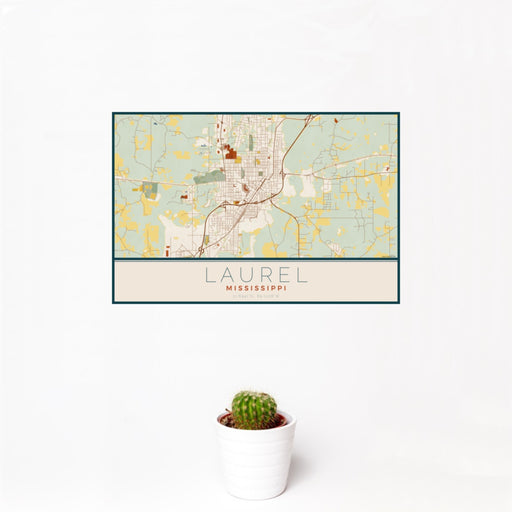12x18 Laurel Mississippi Map Print Landscape Orientation in Woodblock Style With Small Cactus Plant in White Planter