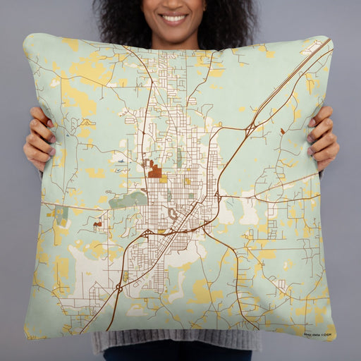 Person holding 22x22 Custom Laurel Mississippi Map Throw Pillow in Woodblock