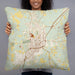 Person holding 22x22 Custom Laurel Mississippi Map Throw Pillow in Woodblock