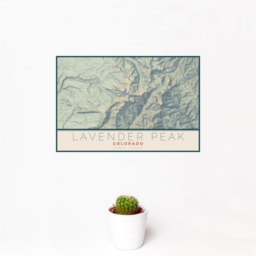 12x18 Lavender Peak Colorado Map Print Landscape Orientation in Woodblock Style With Small Cactus Plant in White Planter