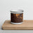 Front View Custom Lawrence Indiana Map Enamel Mug in Ember on Cutting Board