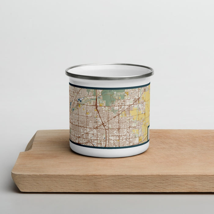 Front View Custom Lawrence Indiana Map Enamel Mug in Woodblock on Cutting Board