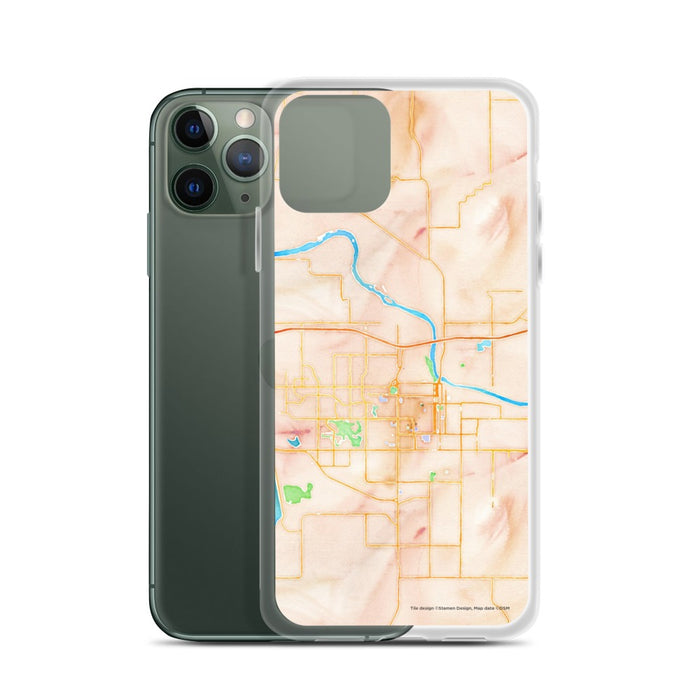 Custom Lawrence Kansas Map Phone Case in Watercolor on Table with Laptop and Plant