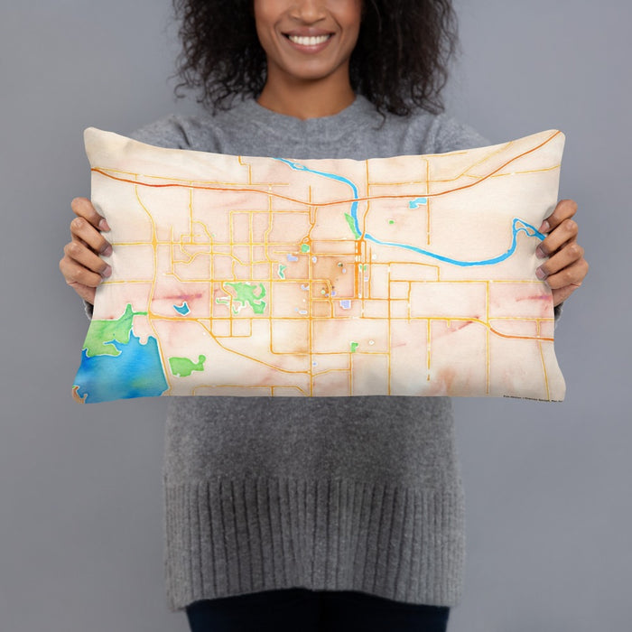 Person holding 20x12 Custom Lawrence Kansas Map Throw Pillow in Watercolor