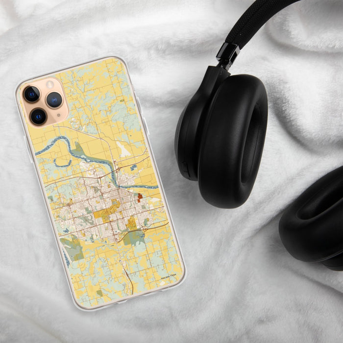 Custom Lawrence Kansas Map Phone Case in Woodblock on Table with Black Headphones