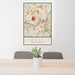 24x36 Lawrence Massachusetts Map Print Portrait Orientation in Woodblock Style Behind 2 Chairs Table and Potted Plant