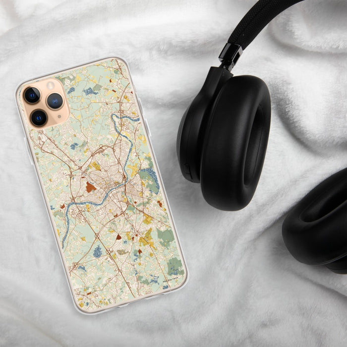 Custom Lawrence Massachusetts Map Phone Case in Woodblock on Table with Black Headphones
