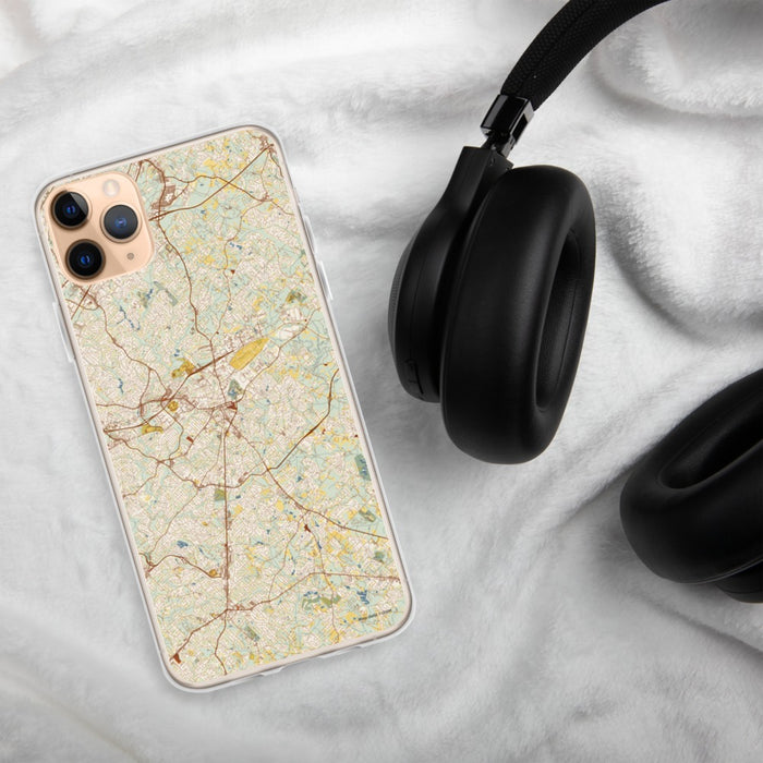 Custom Lawrenceville Georgia Map Phone Case in Woodblock on Table with Black Headphones