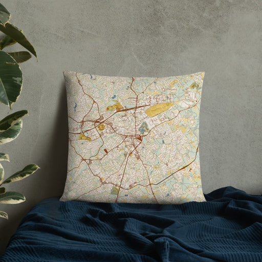 Custom Lawrenceville Georgia Map Throw Pillow in Woodblock on Bedding Against Wall