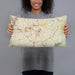 Person holding 20x12 Custom Lawrenceville Georgia Map Throw Pillow in Woodblock
