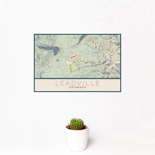 12x18 Leadville Colorado Map Print Landscape Orientation in Woodblock Style With Small Cactus Plant in White Planter