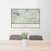 24x36 Leadville Colorado Map Print Landscape Orientation in Woodblock Style Behind 2 Chairs Table and Potted Plant