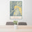24x36 Leavenworth Washington Map Print Portrait Orientation in Woodblock Style Behind 2 Chairs Table and Potted Plant
