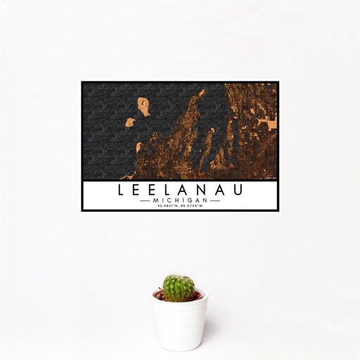 12x18 Leelanau Michigan Map Print Landscape Orientation in Ember Style With Small Cactus Plant in White Planter