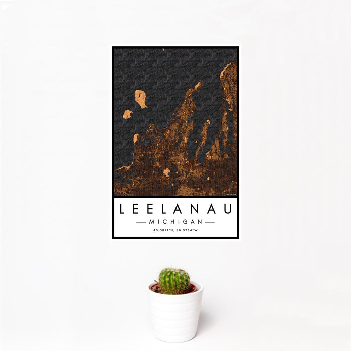 12x18 Leelanau Michigan Map Print Portrait Orientation in Ember Style With Small Cactus Plant in White Planter