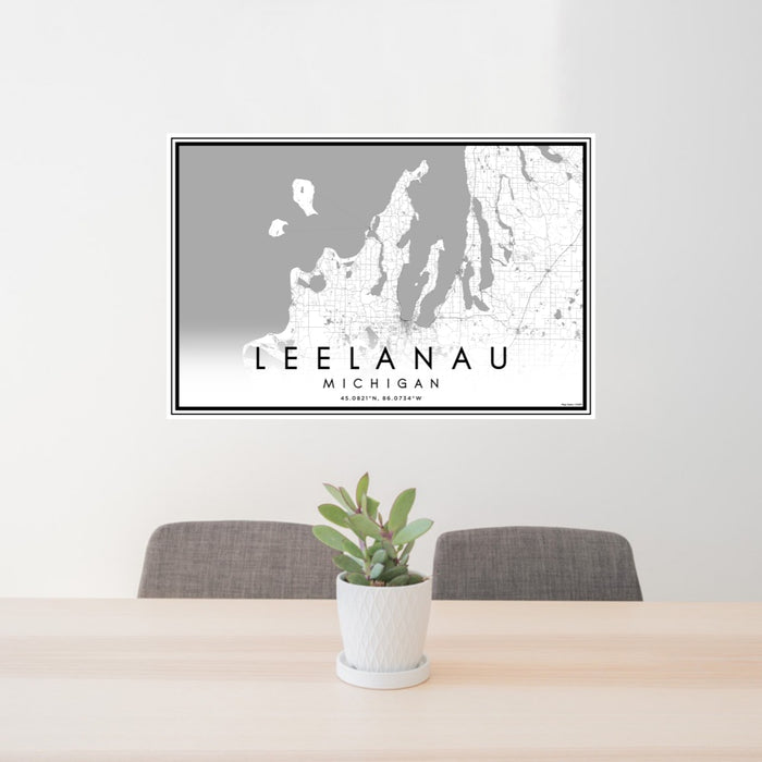 24x36 Leelanau Michigan Map Print Lanscape Orientation in Classic Style Behind 2 Chairs Table and Potted Plant