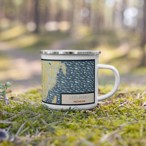 Right View Custom Leelanau Michigan Map Enamel Mug in Woodblock on Grass With Trees in Background