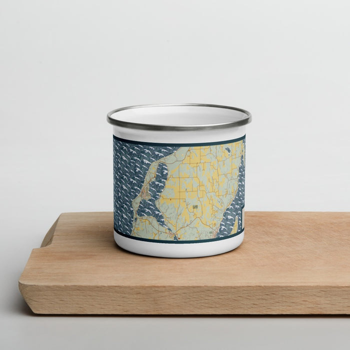 Front View Custom Leelanau Michigan Map Enamel Mug in Woodblock on Cutting Board
