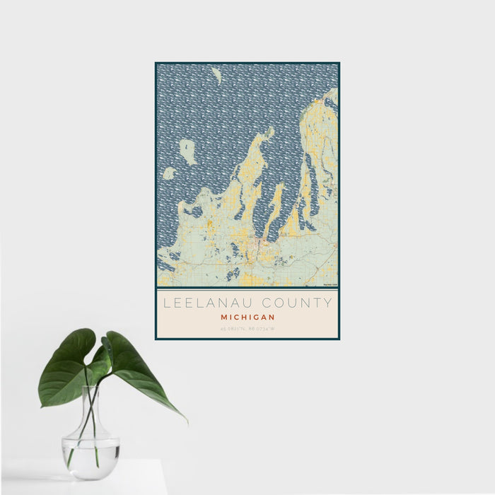 16x24 Leelanau County Michigan Map Print Portrait Orientation in Woodblock Style With Tropical Plant Leaves in Water