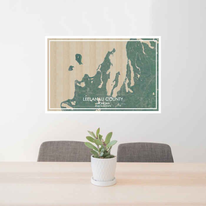 24x36 Leelanau County Michigan Map Print Lanscape Orientation in Afternoon Style Behind 2 Chairs Table and Potted Plant