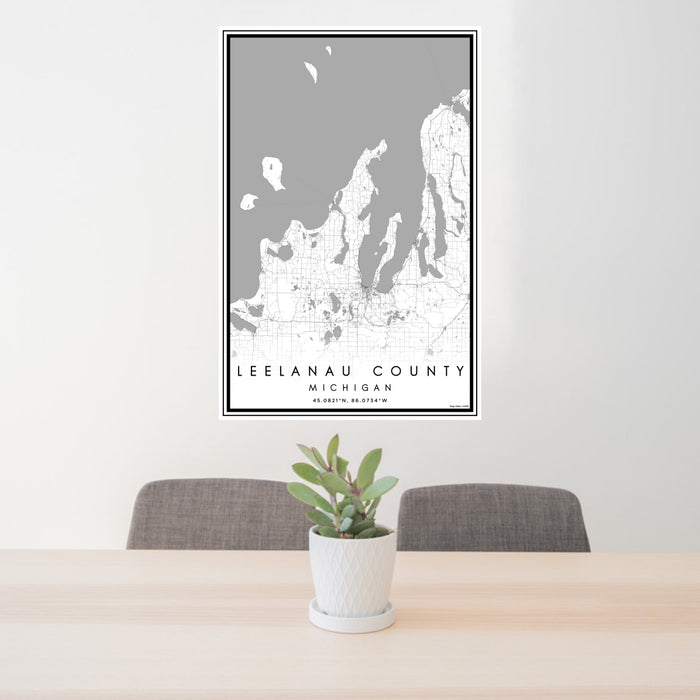 24x36 Leelanau County Michigan Map Print Portrait Orientation in Classic Style Behind 2 Chairs Table and Potted Plant