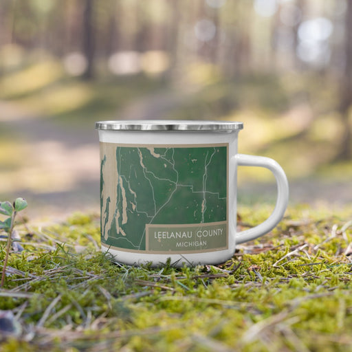 Right View Custom Leelanau County Michigan Map Enamel Mug in Afternoon on Grass With Trees in Background