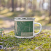 Right View Custom Leelanau County Michigan Map Enamel Mug in Afternoon on Grass With Trees in Background