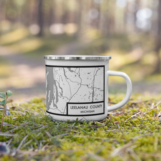 Right View Custom Leelanau County Michigan Map Enamel Mug in Classic on Grass With Trees in Background