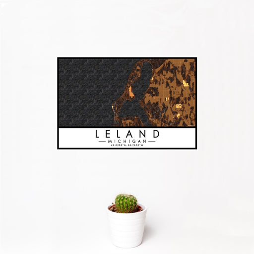 12x18 Leland Michigan Map Print Landscape Orientation in Ember Style With Small Cactus Plant in White Planter