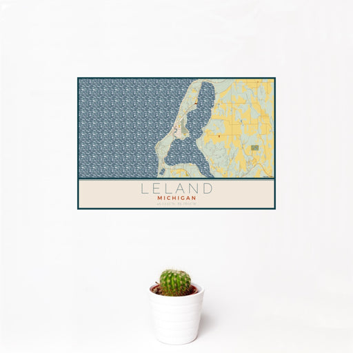 12x18 Leland Michigan Map Print Landscape Orientation in Woodblock Style With Small Cactus Plant in White Planter